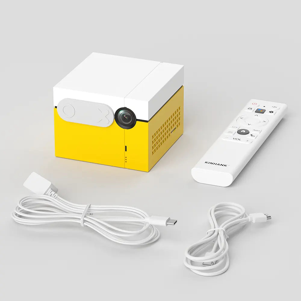 Yellow and white device with a camera lens, remote control, and cables on a light gray background