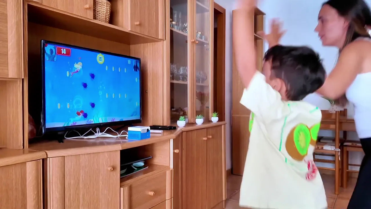 A parent and child sharing a KINHANK MotionX game